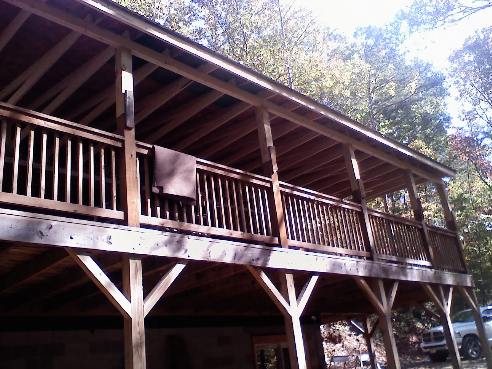 Timber framing under a new elevated porch and deck — Roof Leak Repair in Bonaparte by Roofing Brothers